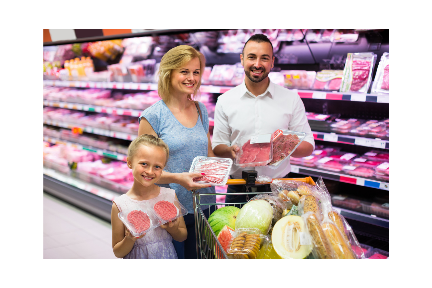Family in meat section at grocery store