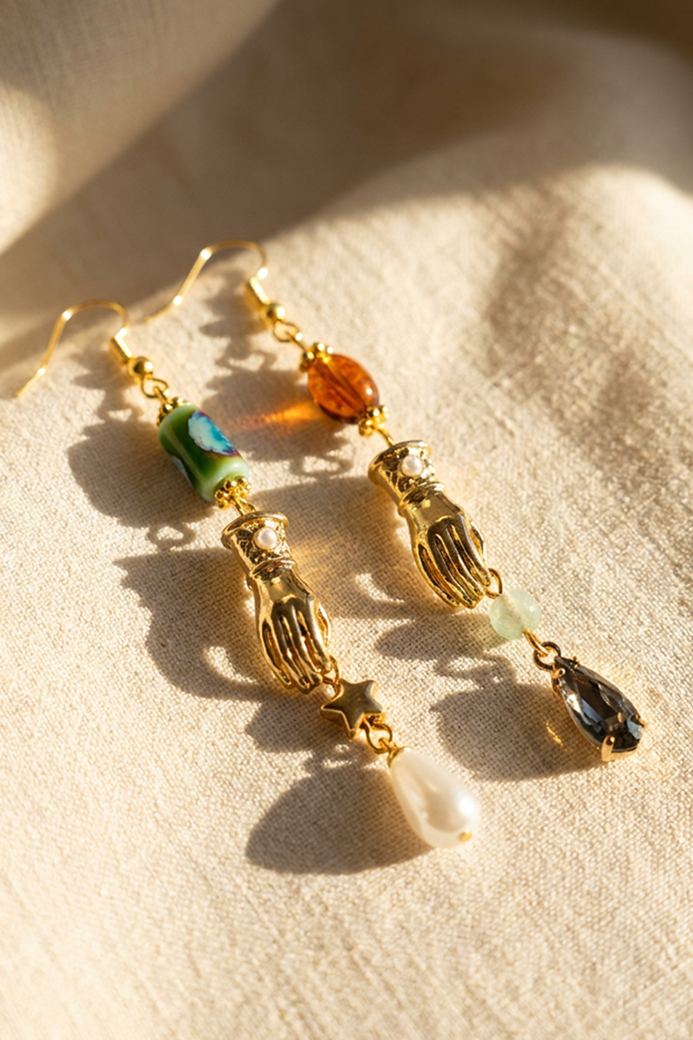 The Hands That Hold a Story Earrings