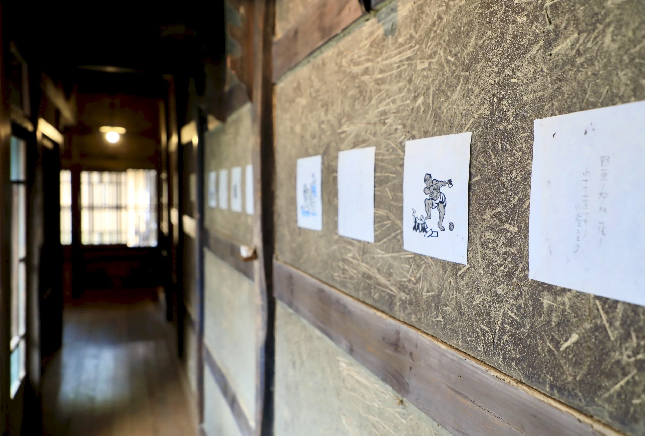 Interior corridor at Takyo Abeke lined with small woodblock prints
