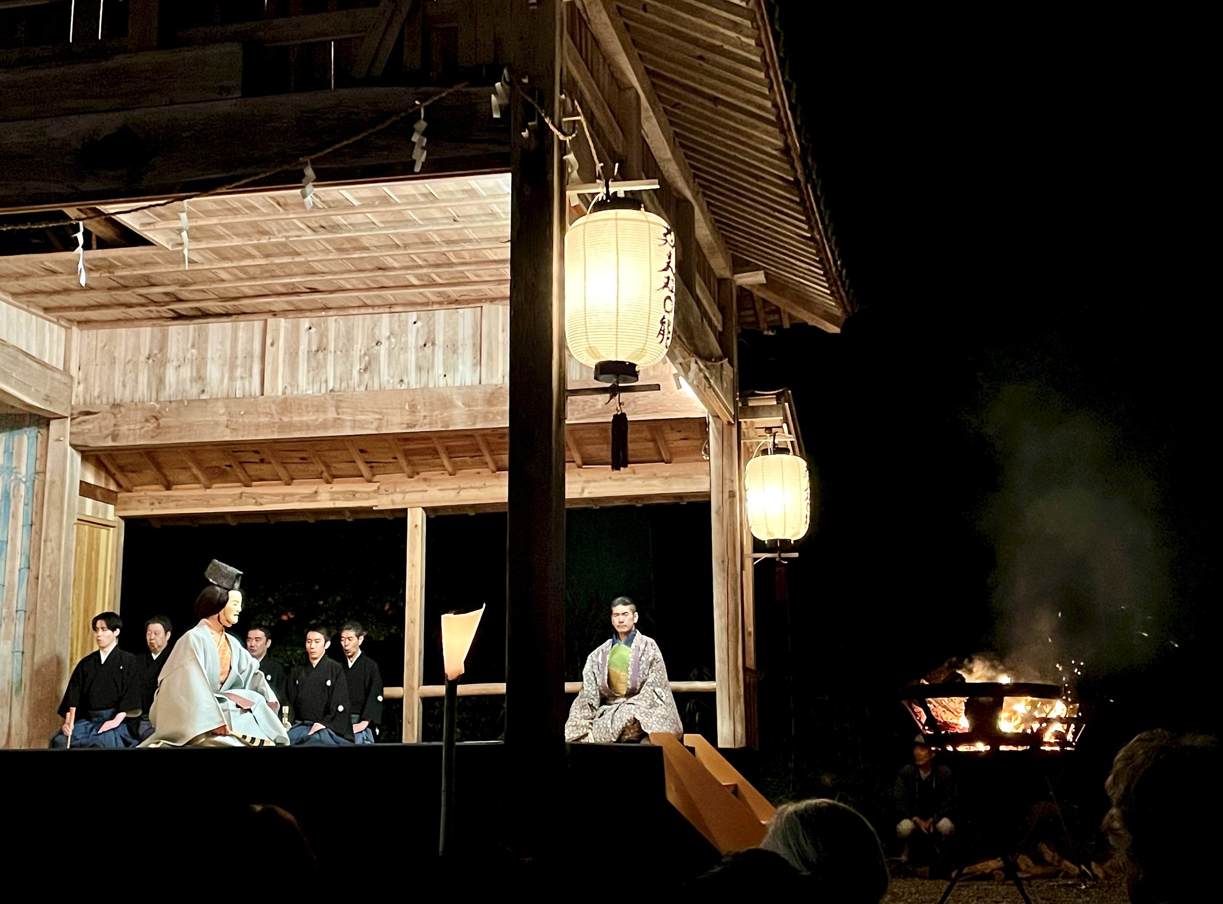 Takigi Noh performance illuminated by lanterns and firelight on Sado Island