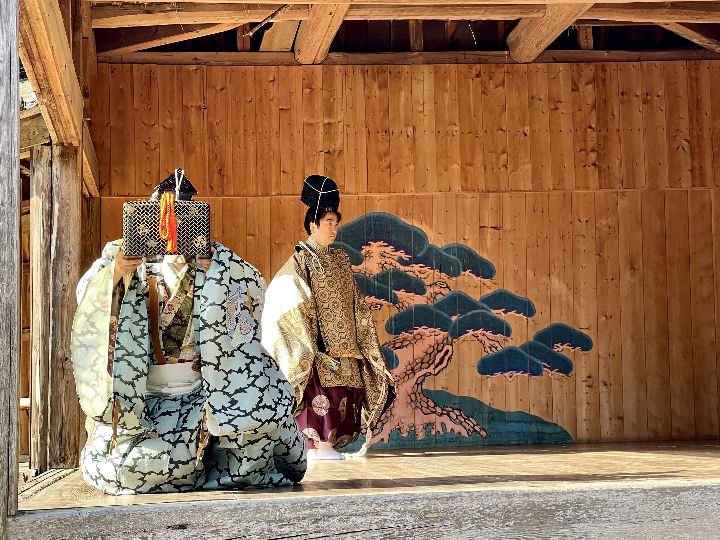Noh performer in waki role holding a box during the opening of Okina Sanbaso at Kamo Shrine on Sado Island