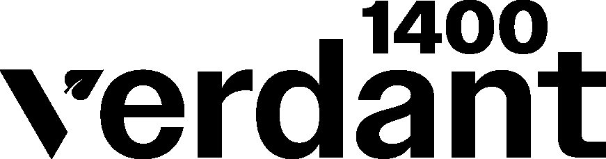 A person holding a camera, taking a photo outdoors with trees and a body of water in the background.