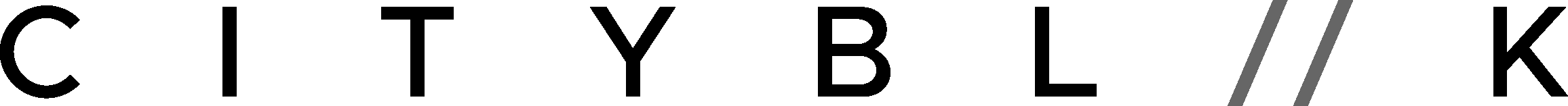 Close-up of a typographic poster with black background and white and yellow text about Memorial Day sales and an online store.