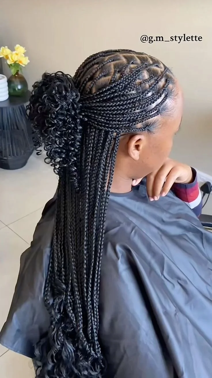 The Half-Up Artisan Silhouette
Name: The Versatile Half-Up Ritual

Description: "This silhouette offers the perfect balance of polished structure and effortless volume. Featuring a meticulously parted crown gathered into a sophisticated top-knot, the