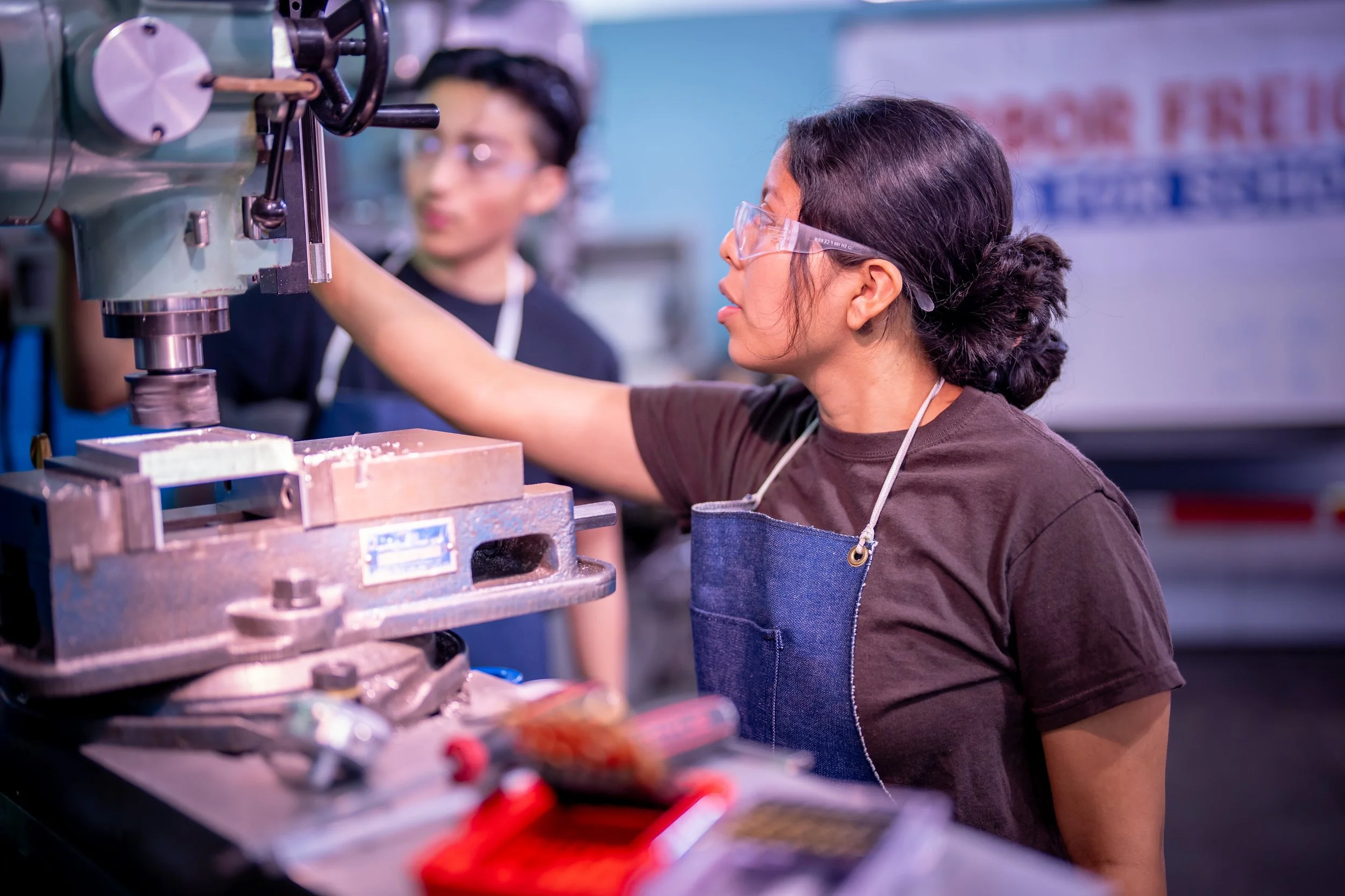 Students using machinery