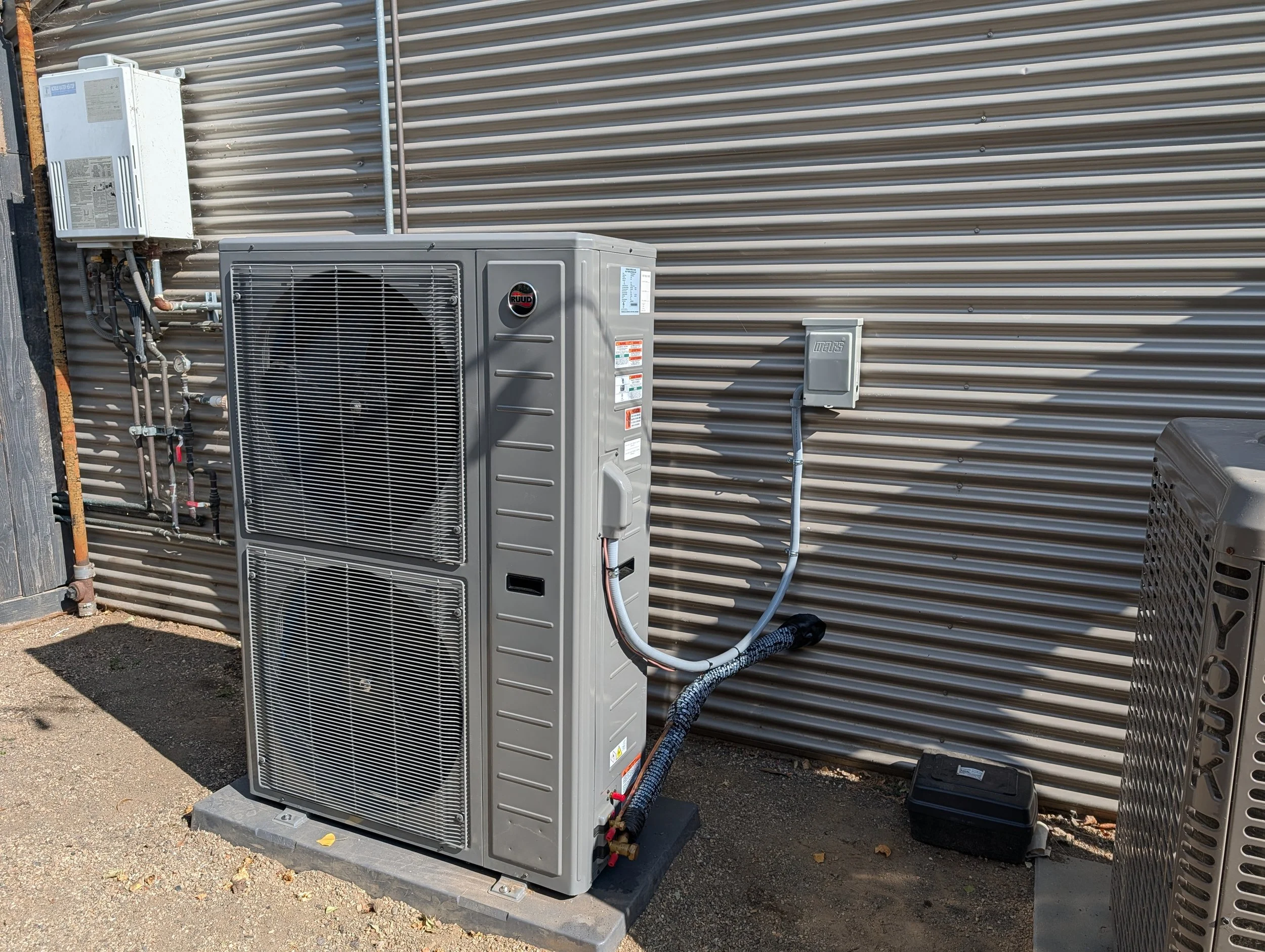 A high-efficiency air conditioner installed on a commercial building.