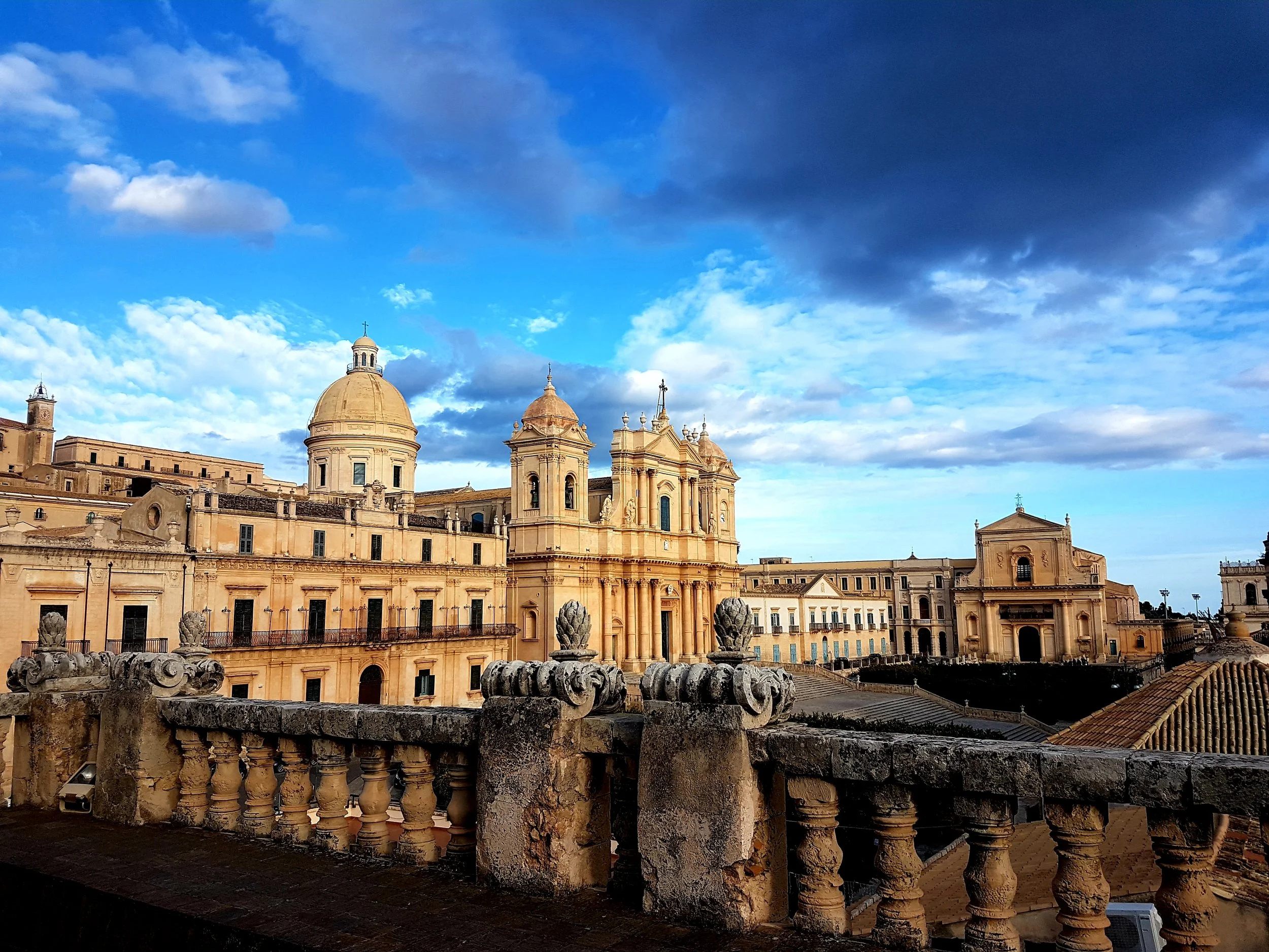 View of historic buildings and churches in Noto, Sicily--traveling simply, beautifully with Italy Within Reach