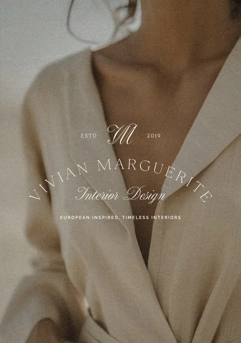 Close-up of a woman's upper body wearing a beige blazer, with text overlay promoting Vivian Marguerite Interior Design and European-inspired interiors.