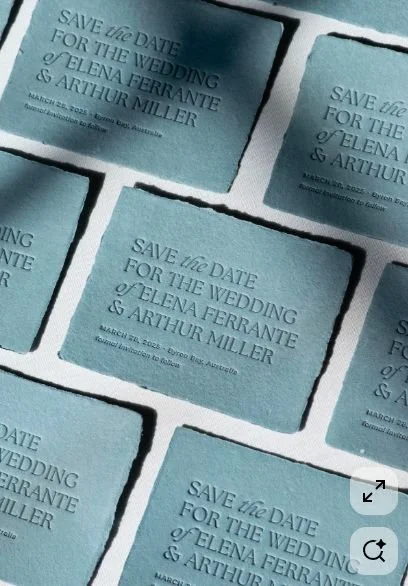 Multiple light blue wedding save the date cards for Elena Ferrante and Arthur Miller with wedding date March 28, 202X, arranged in a collage.