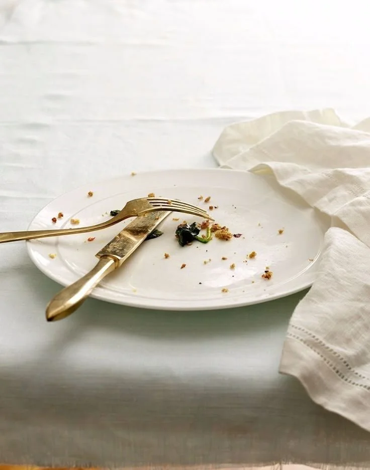Empty white plate with leftover crumbs caramel apples
