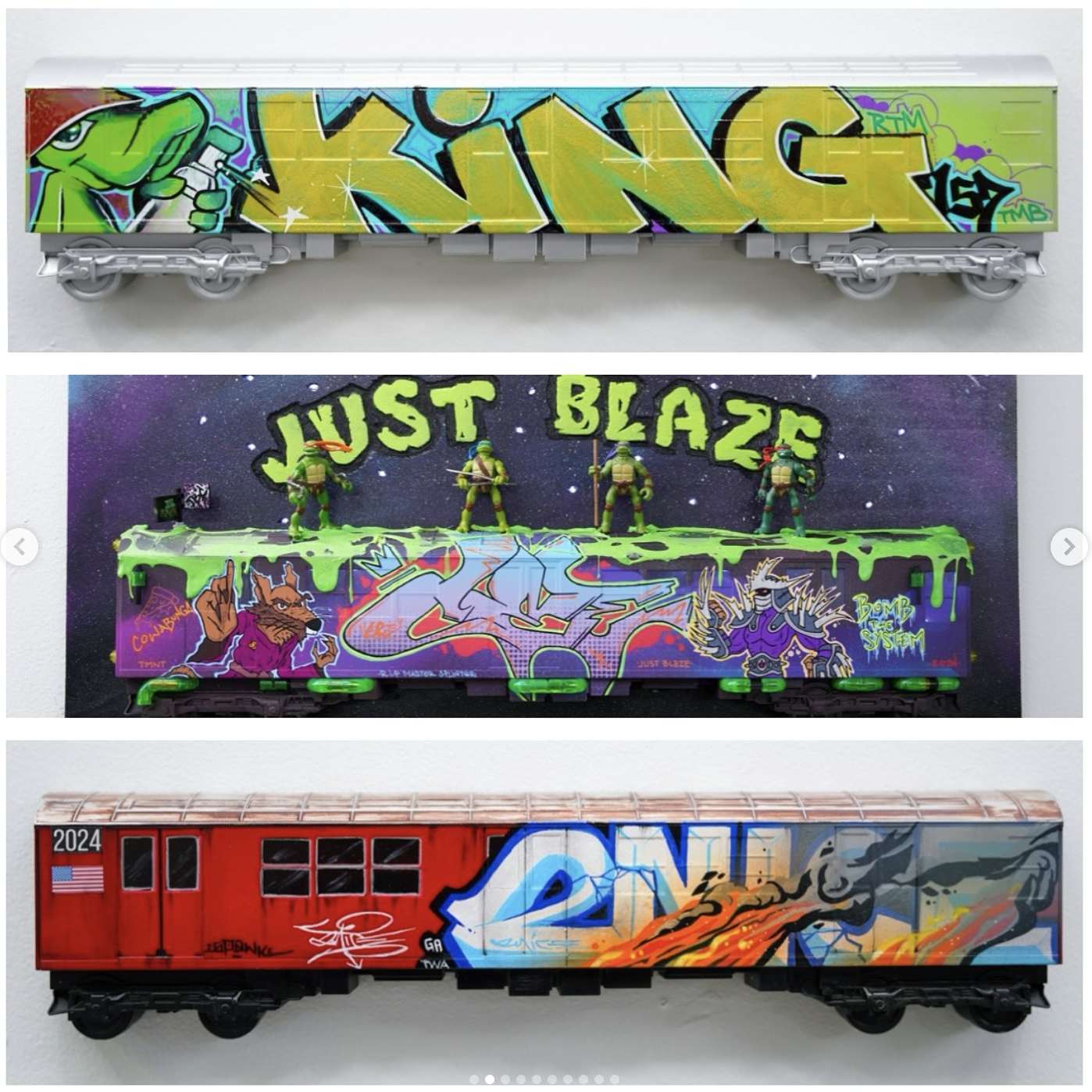 Three model train cars decorated with graffiti artwork, each featuring unique vibrant designs and characters.