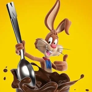 Cartoon rabbit with big ears, holding a large spoon, surrounded by flowing chocolate on a yellow background.
