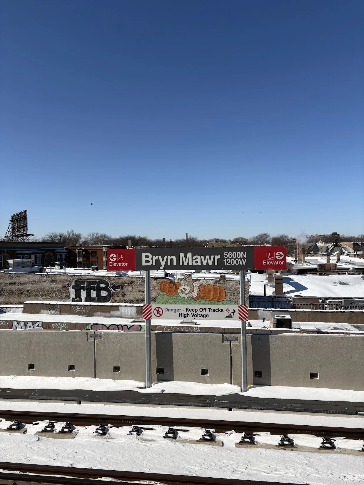 Bryn Mawr CTA. Edgewater, Chicago. Pumpkin Graffiti. Snow Blue Skies. CTA train tracks