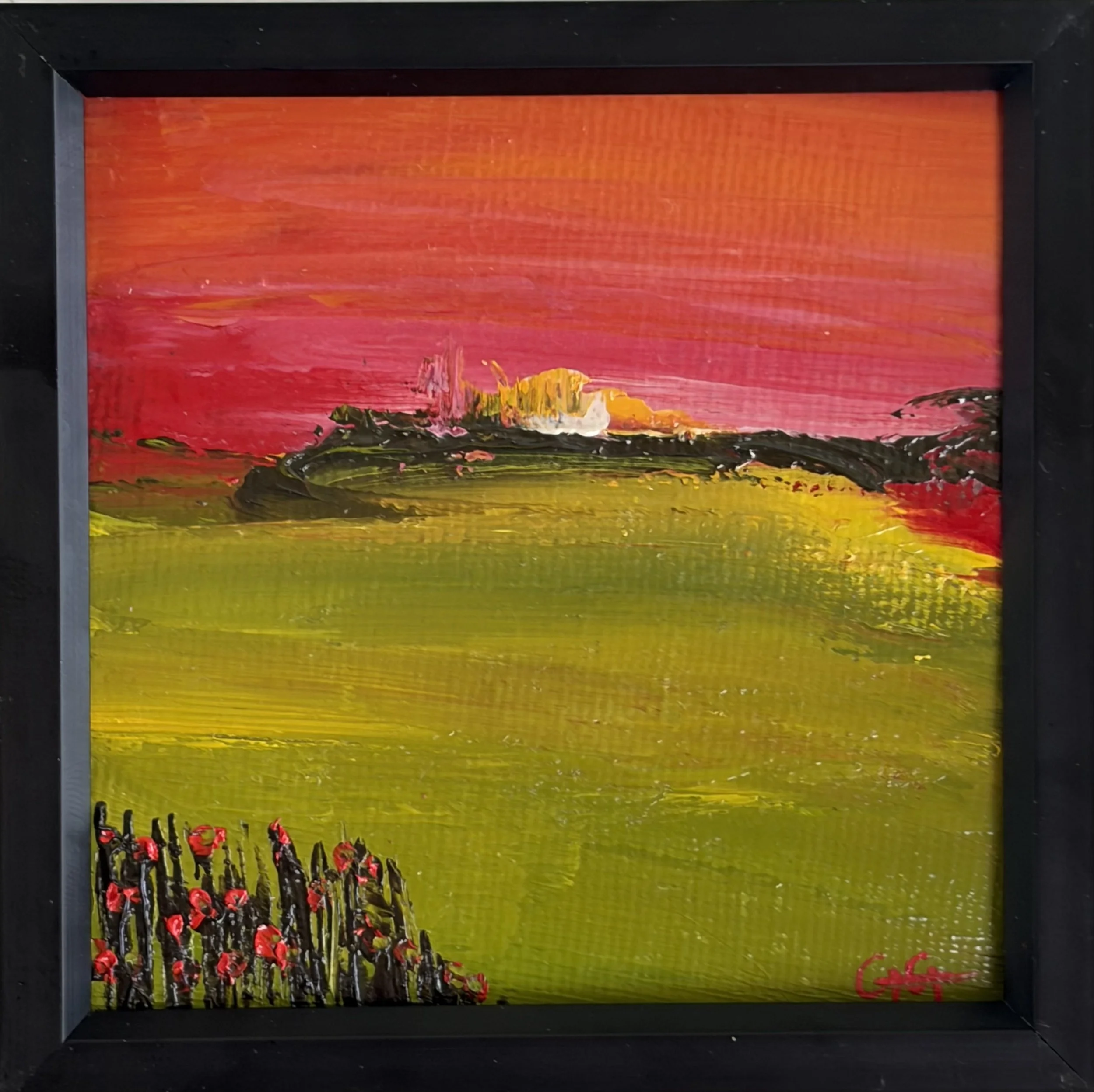 Landscape painting of a sunset with a pink and orange sky, green foreground, dark silhouette of trees, and red flowers in the bottom left corner.