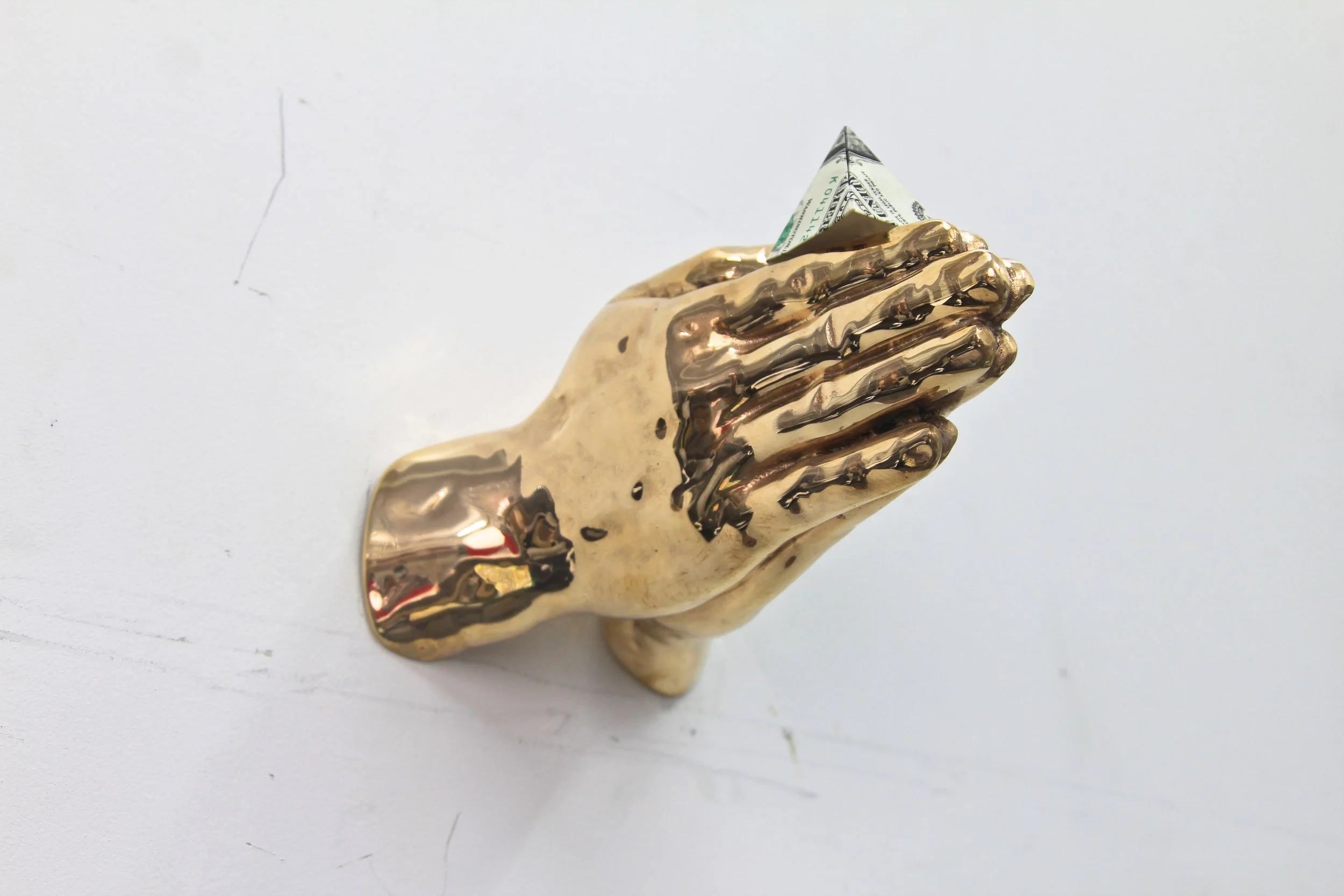 IN GOD WE TRUST EVERYONE ELSE
PAYS CASH - EAGLE (side view), 2015, Bronze and Dollar Bills, 6 x 8 x 5 inches (15.2 x 20.3 x 12.7 cm)