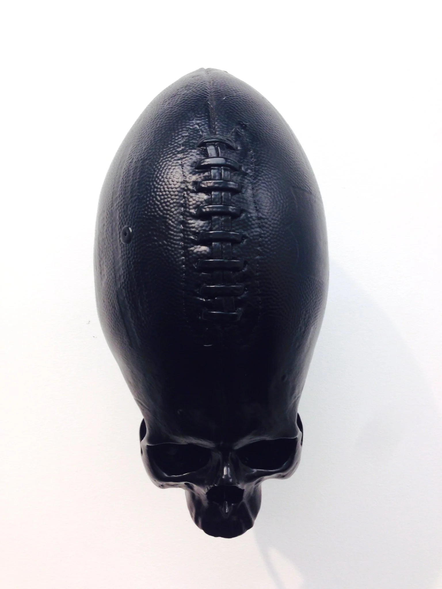 THE END OF THE MATCH - BLACK, 2013, Polyurethane resin, car paint, and steel, 13 x 9 x 7 inches (33 x 22.9 x 17.8 cm)