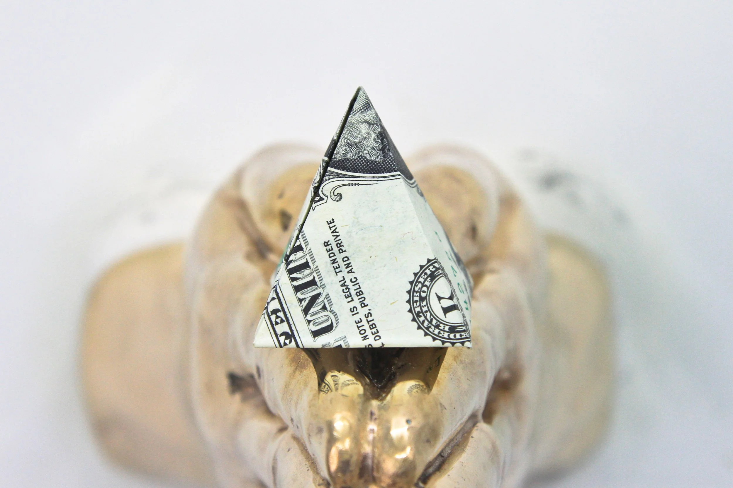 IN GOD WE TRUST EVERYONE ELSE
PAYS CASH - EAGLE (front view), 2015, Bronze and Dollar Bills, 6 x 8 x 5 inches (15.2 x 20.3 x 12.7 cm)