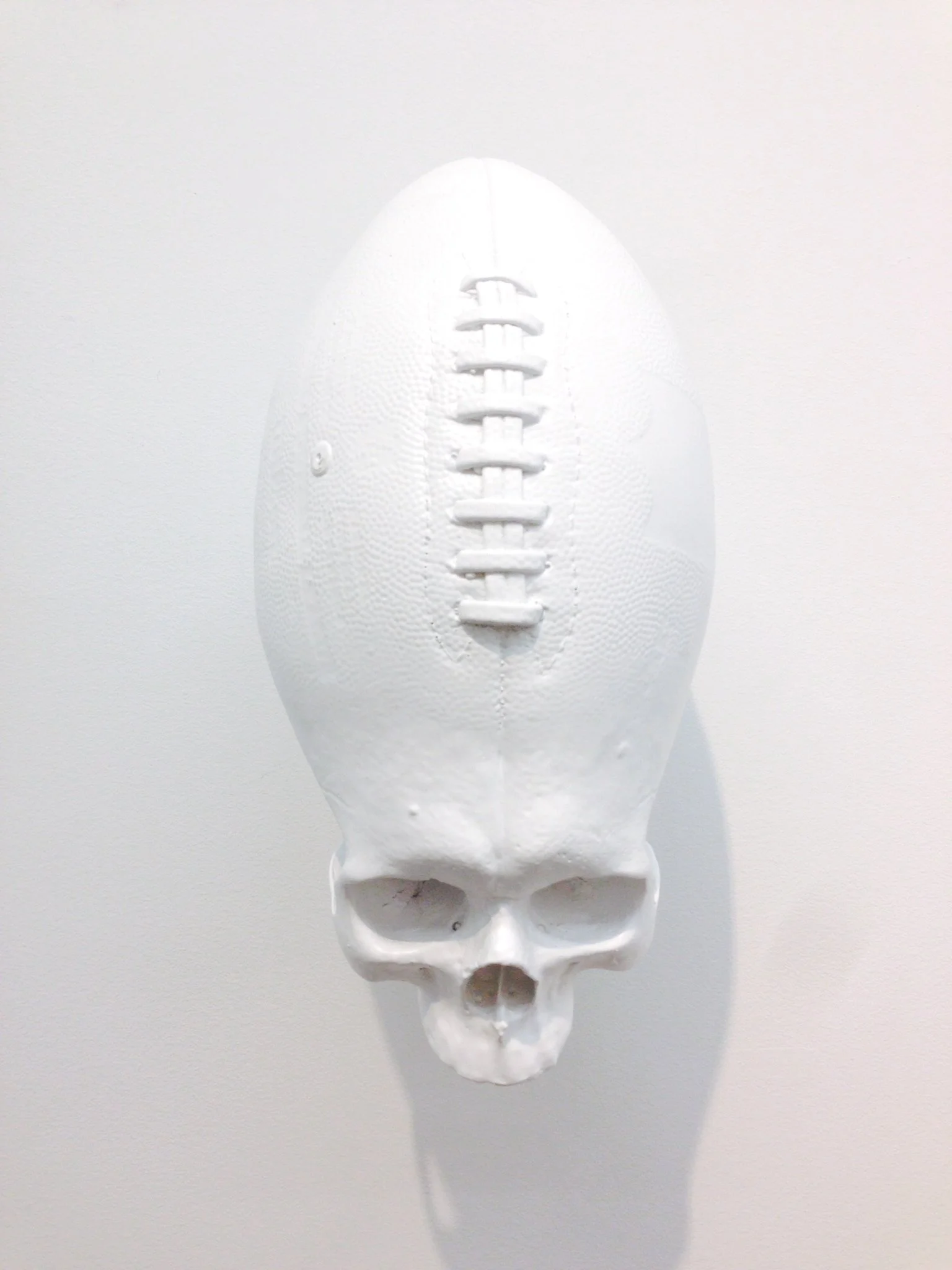 THE END OF THE MATCH - WHITE, 2013, Polyurethane resin, car paint, and steel, 13 x 9 x 7 inches (33 x 22.9 x 17.8 cm)