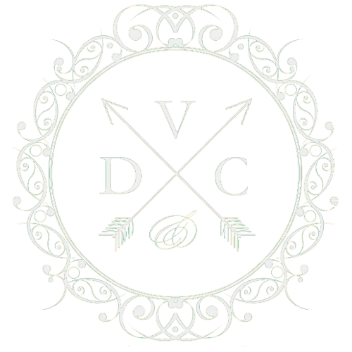 Vantage Design & Construction circle logo.