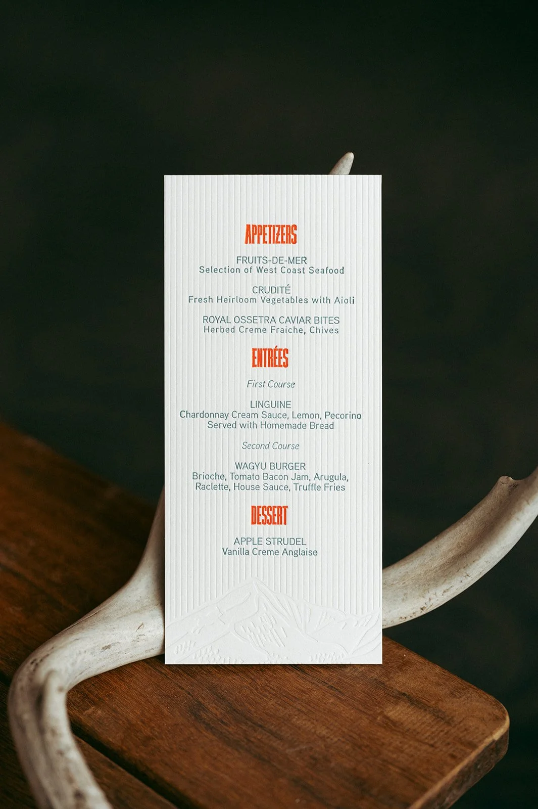 Blind embossed, red foil and blue letterpress menu