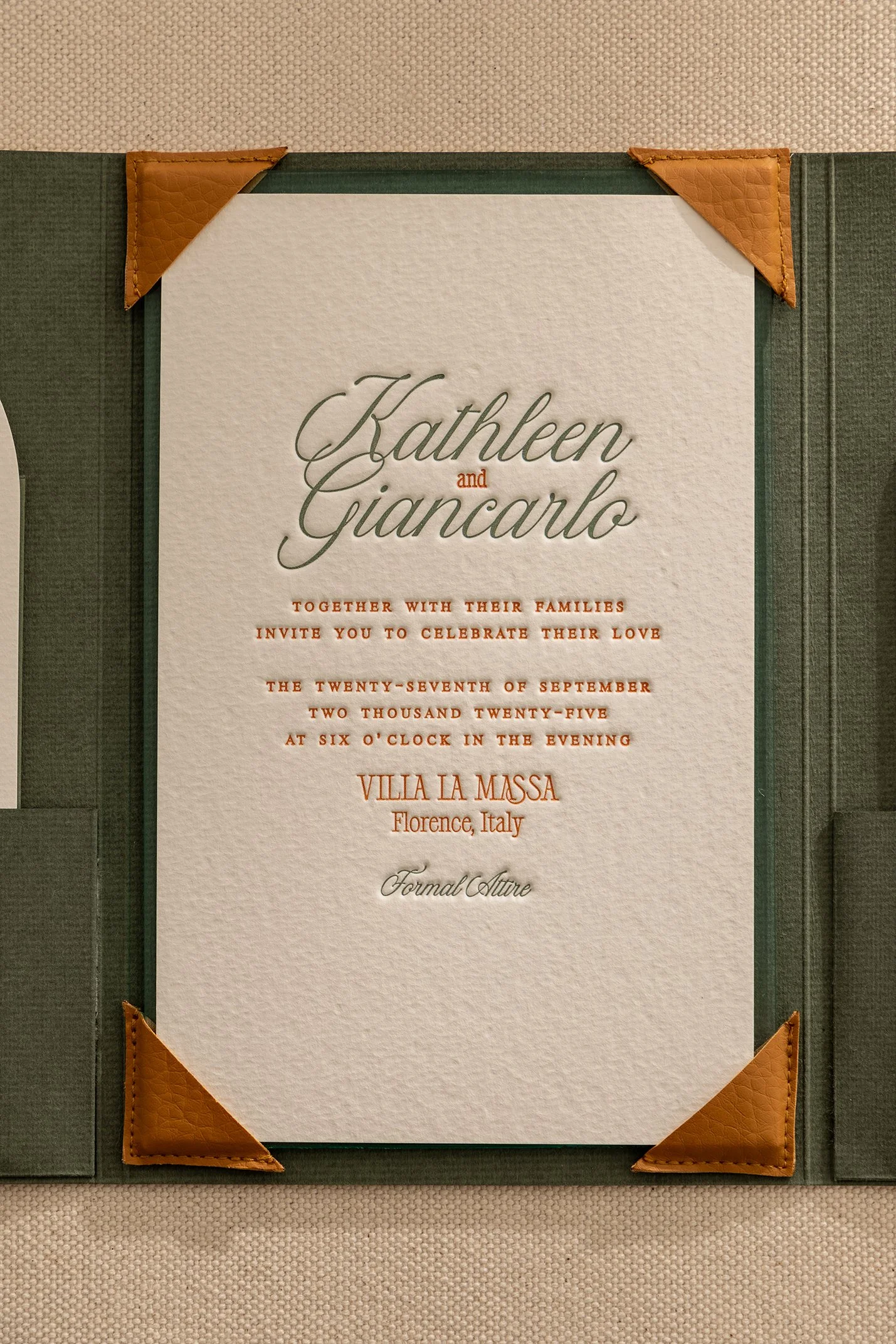 Letterpress wedding invitation with leather accents