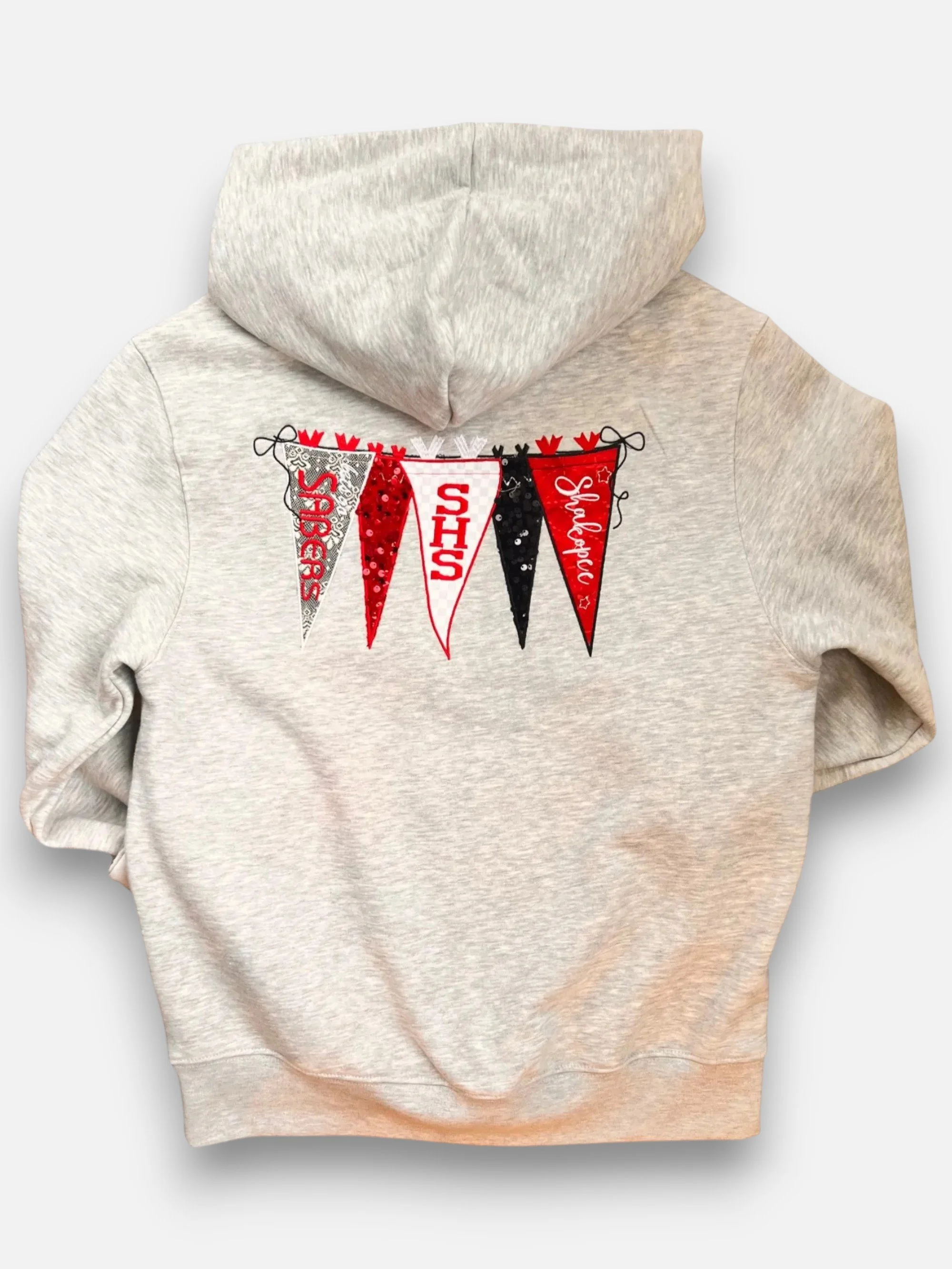 made by hand. every pennant is cut, arranged and stitched with care.