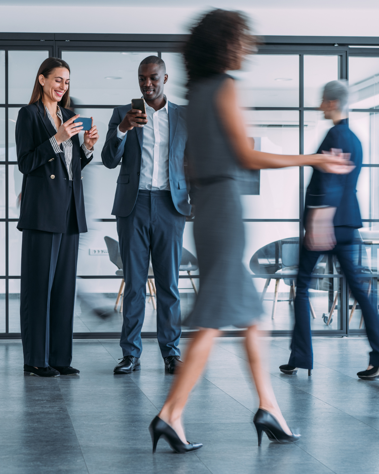 Employees walking in office