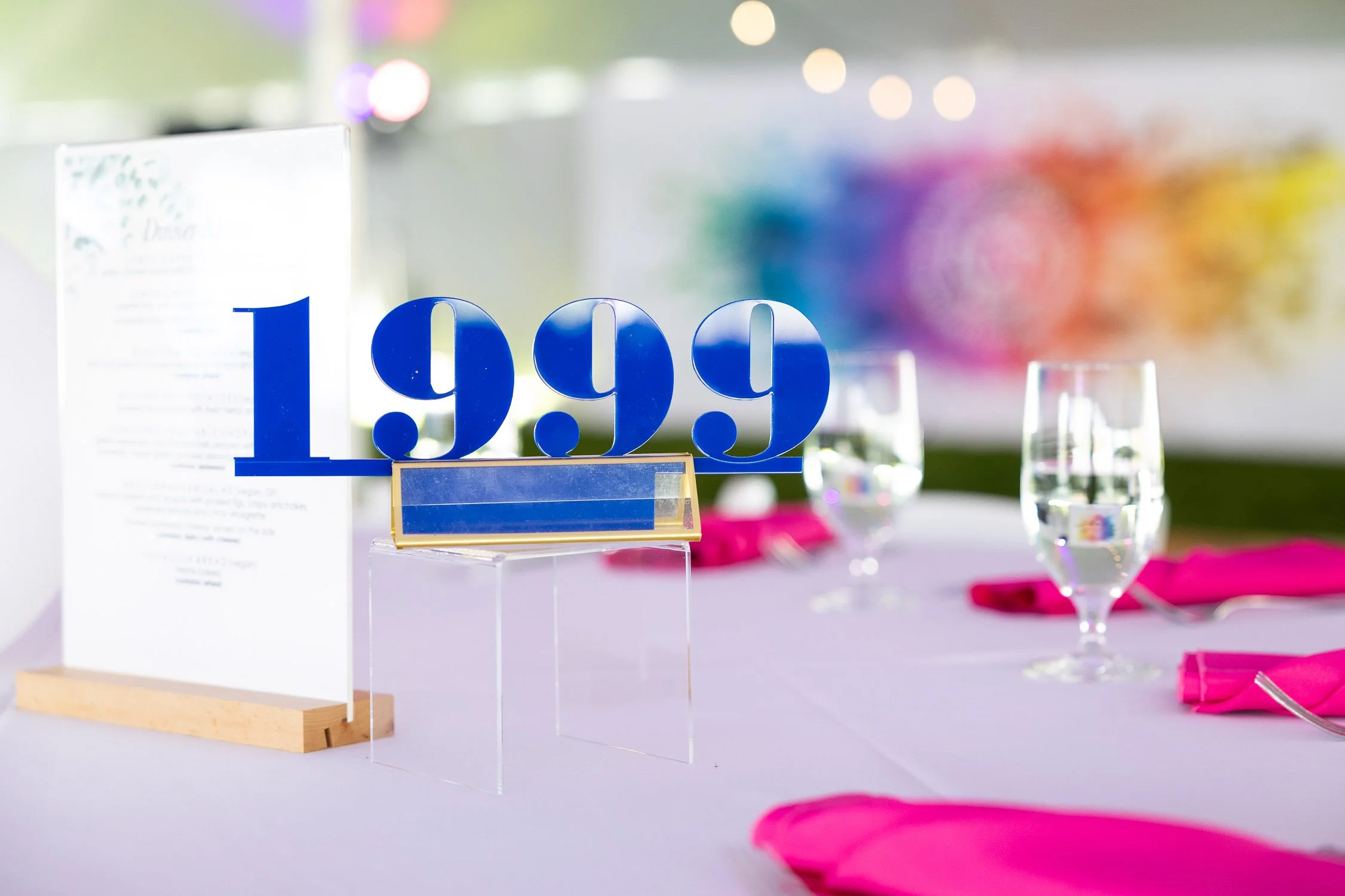 Table setting with a sign showing the year 1999 at a Providence reunion.