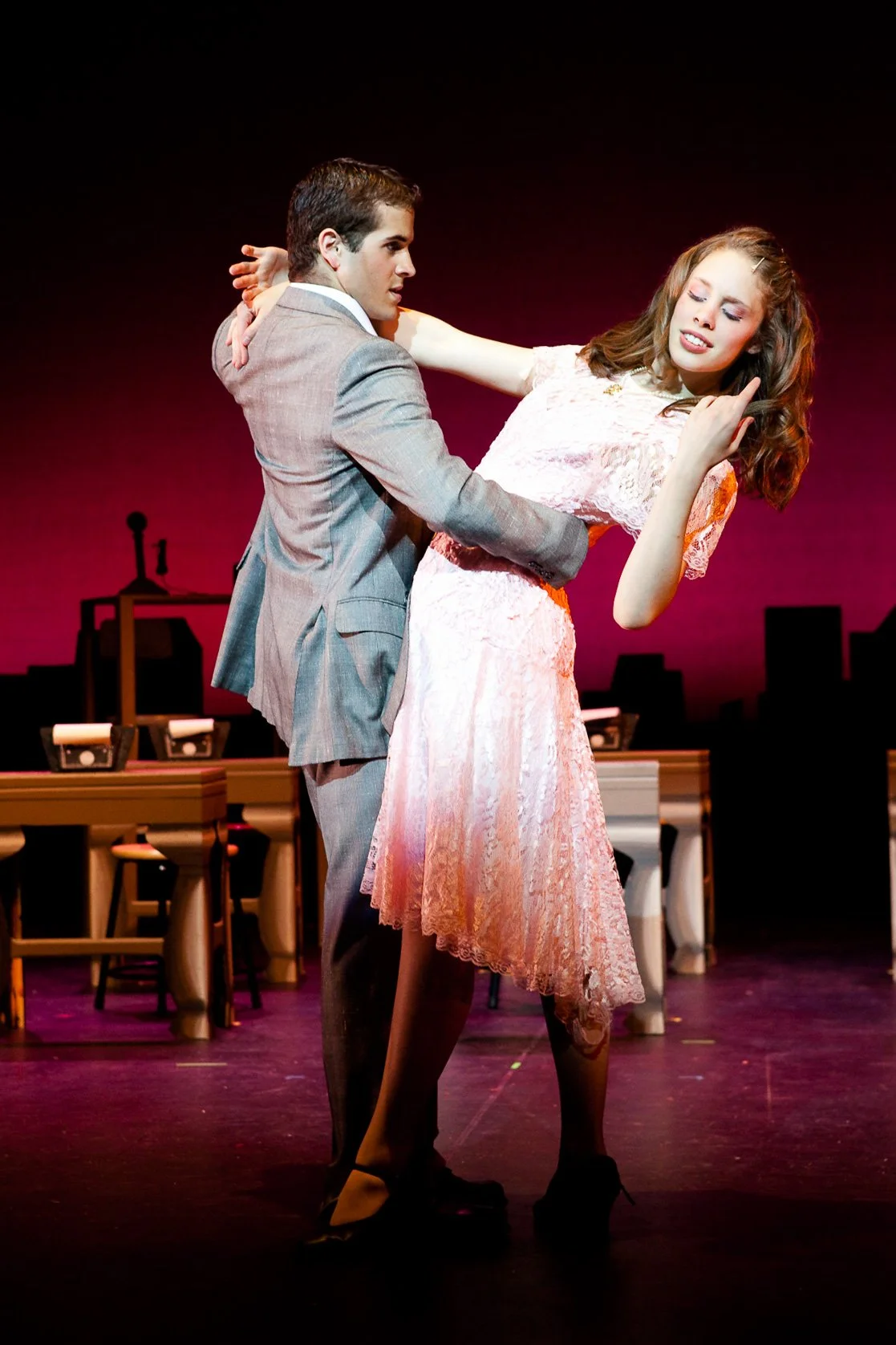 Two high school actors performing a dance on stage at a private Massachusetts high school.