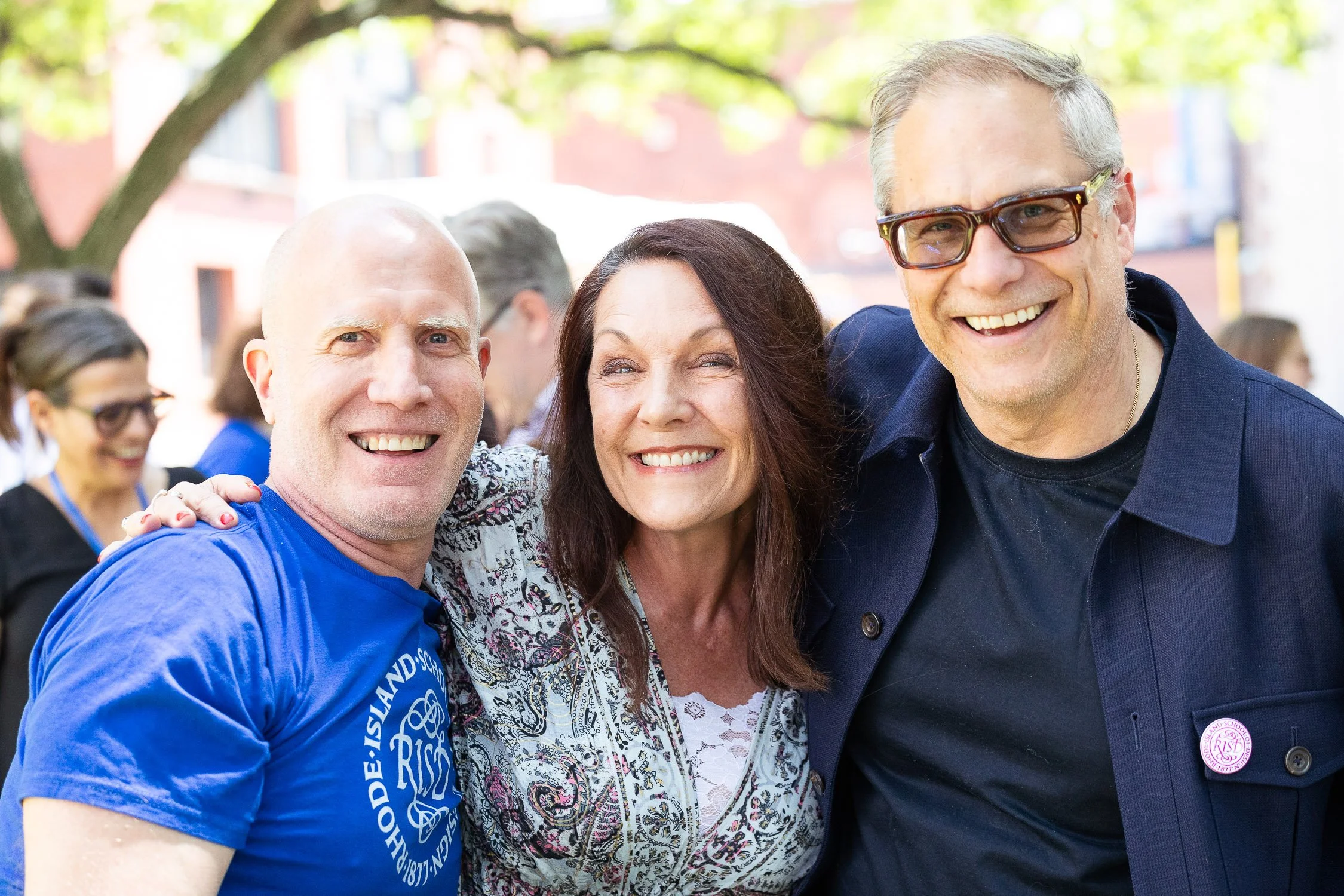 Three smiling people at the Rhode Island College of Design reunion.