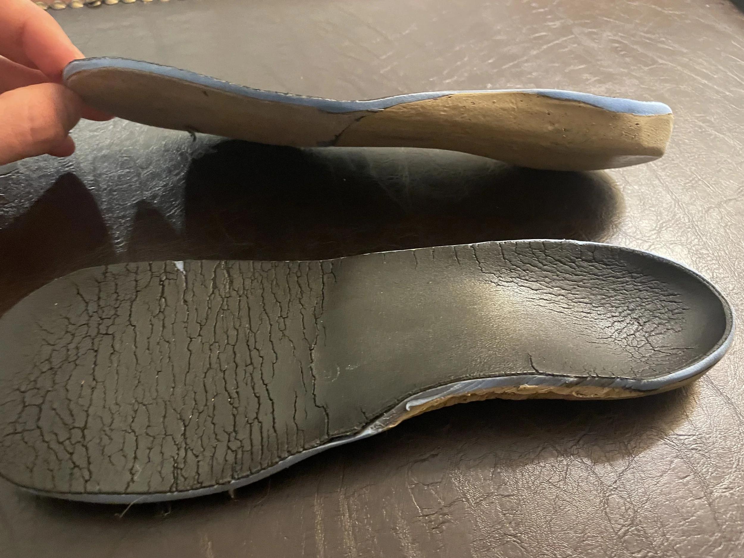 Modified custom orthotics.
