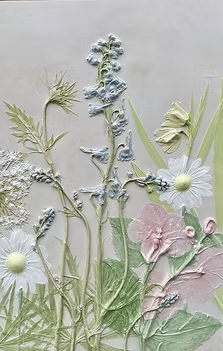 Decorative floral arrangement with white and pink flowers, green leaves, and silver accents on a neutral background.