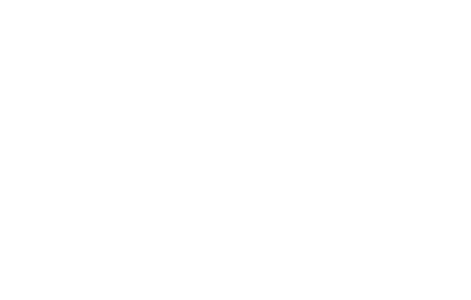 Line drawing of a heart-shaped birthday cake with lit candles and string lights around it.