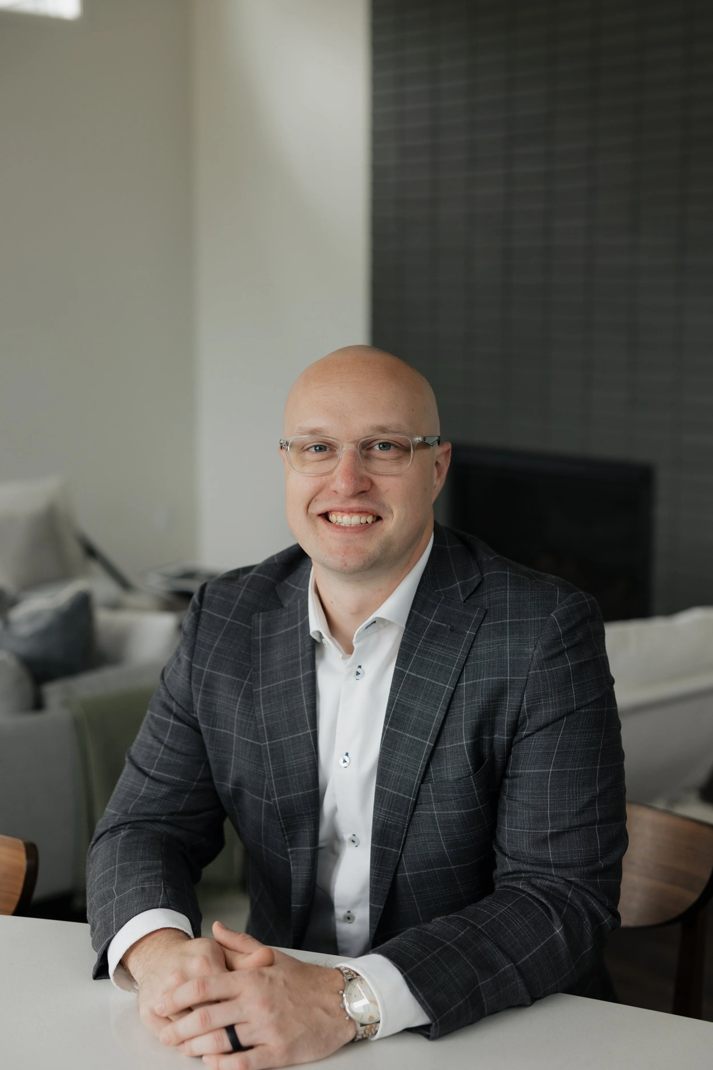 A realtor in Fargo moorhead sitting at an islance of a home in Horace.