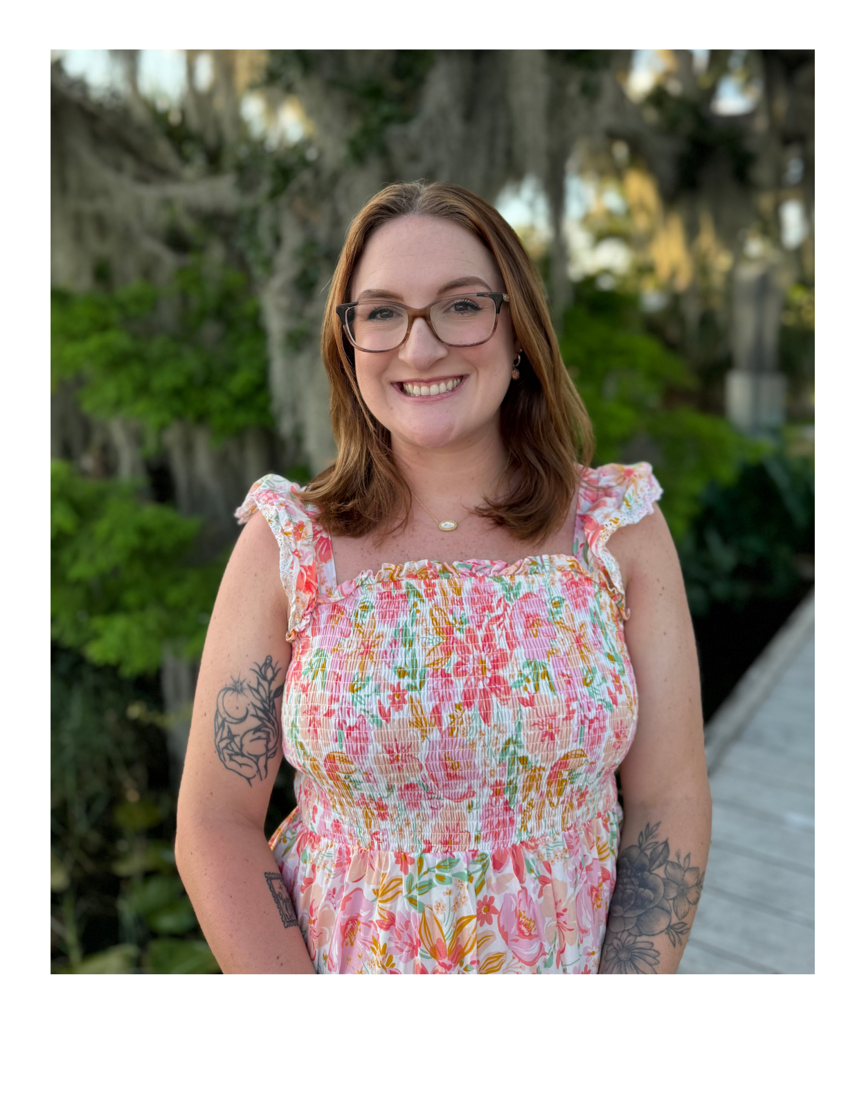 Brittany Haigler, Summerville SC therapist, standing outdoors smiling at the camera.