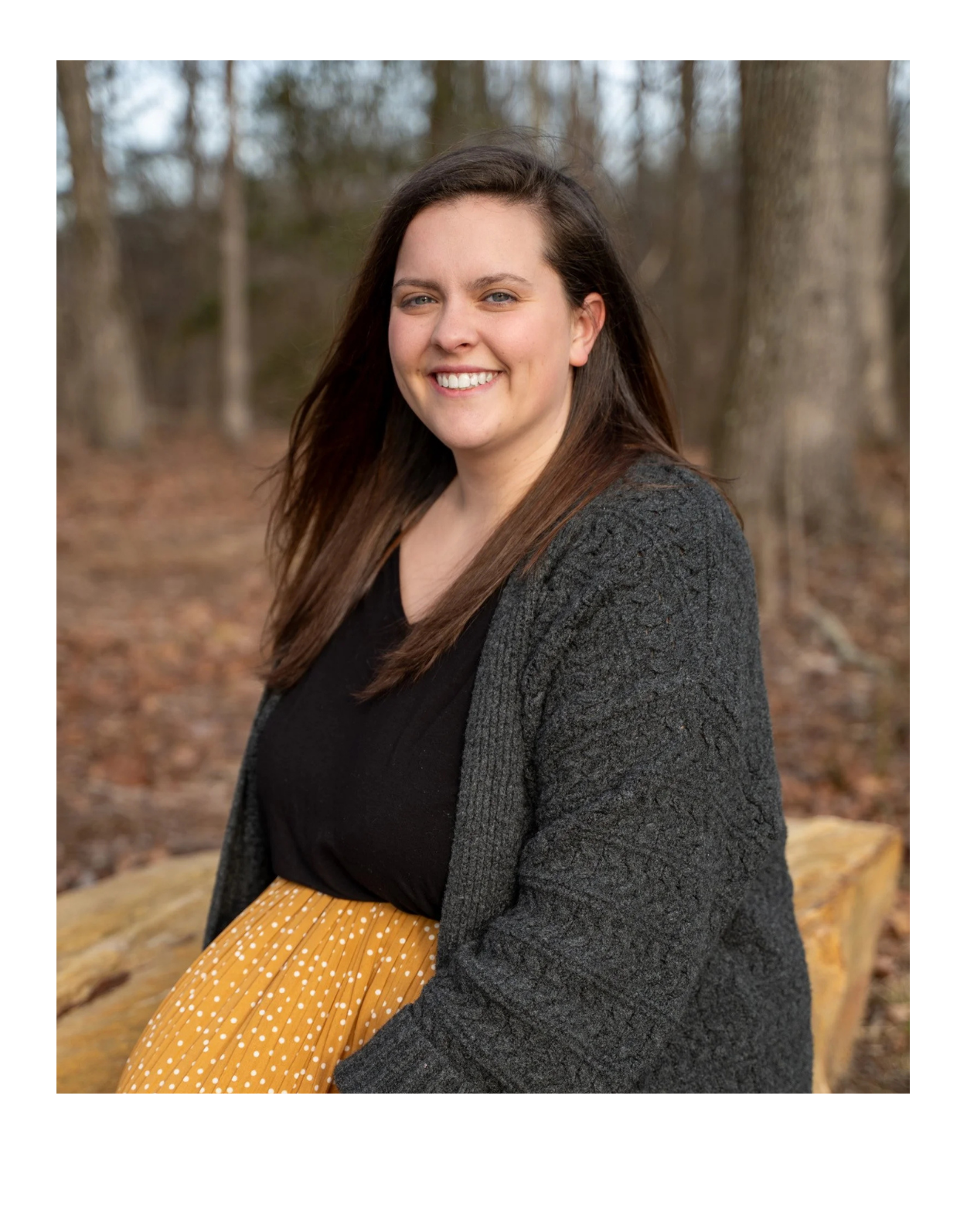 Summerville therapist Anna Wise smiling outdoors with trees in background