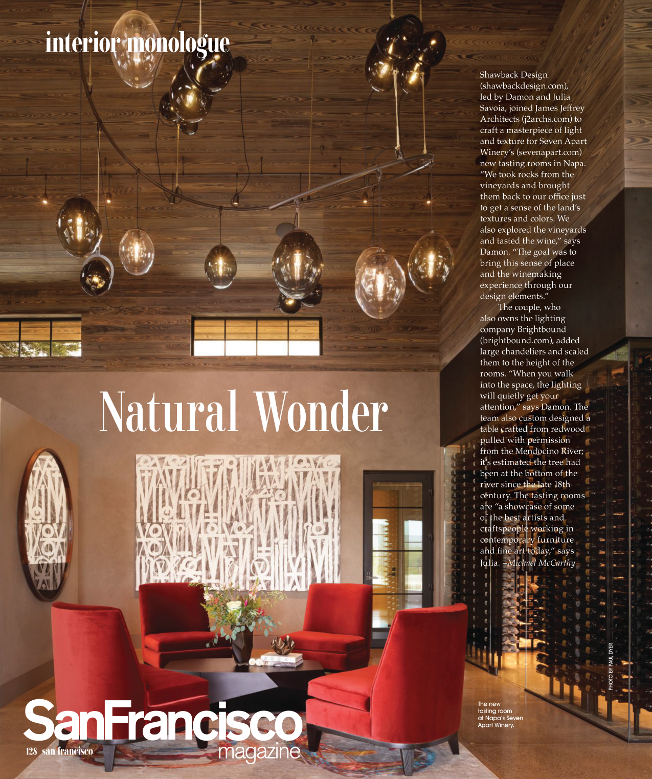 A magazine page featuring an interior design of a tasting room with a high wooden ceiling, modern light fixtures, a wall art piece, and a seating area with red chairs and a black table, labeled 'Natural Wonder' and 'San Francisco magazine'.