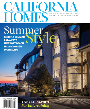 Cover of California Homes magazine featuring a modern multi-story residential building with curved glass walls and blue accents, set against a sunset sky.