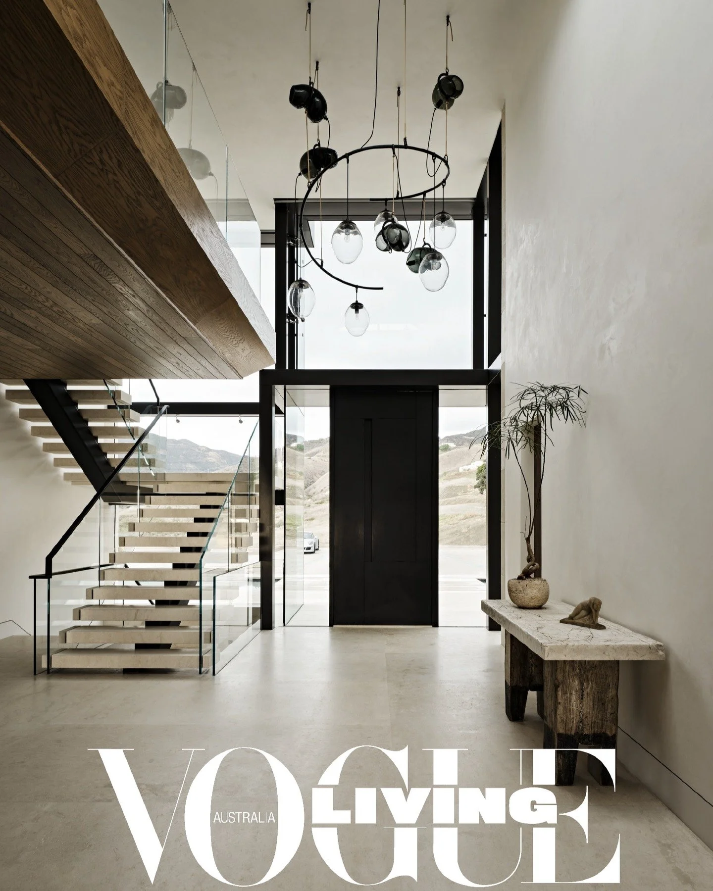 "Inside a modern Malibu masterpiece with stunning views of the Pacific." 

Marc Berger of @hunterhouse_design installed the TwentyTwo (LH22) chandelier in the entry to create immediate impact and scale. Every detail of the residence is cons