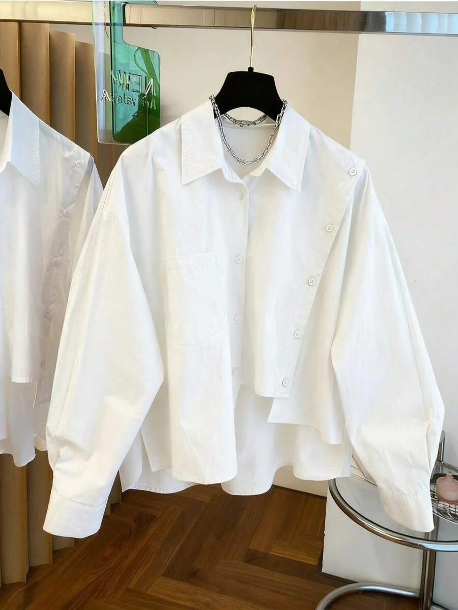 Áo sơ mi phom rộng cách điệu - 150k