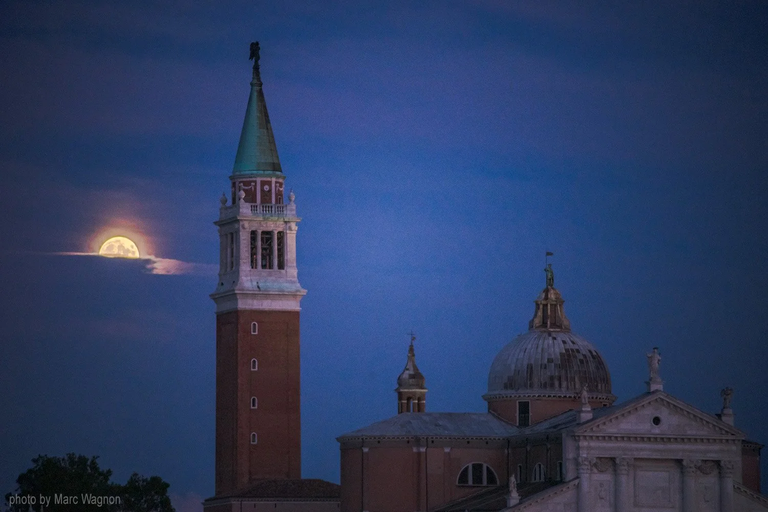 Moon rising over Venice Italy