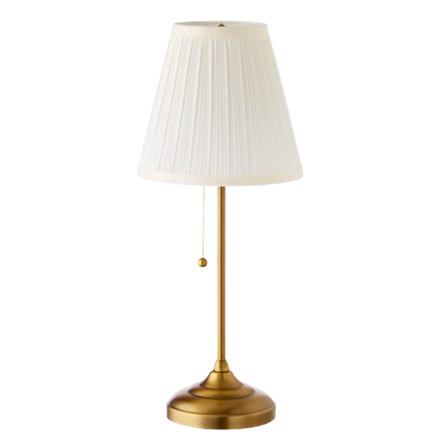 A table lamp with a white pleated lampshade and a brass base.