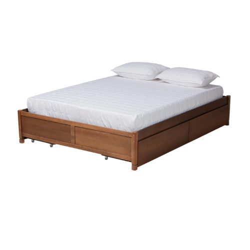 Wooden bed frame with mattress and white pillows and sheets
