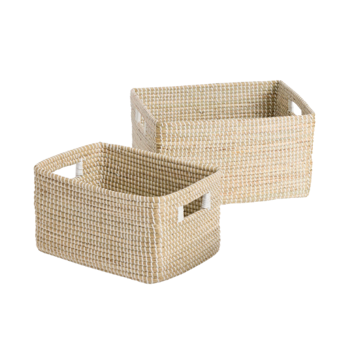 Two beige woven storage baskets, one smaller and one larger, placed on a black background.