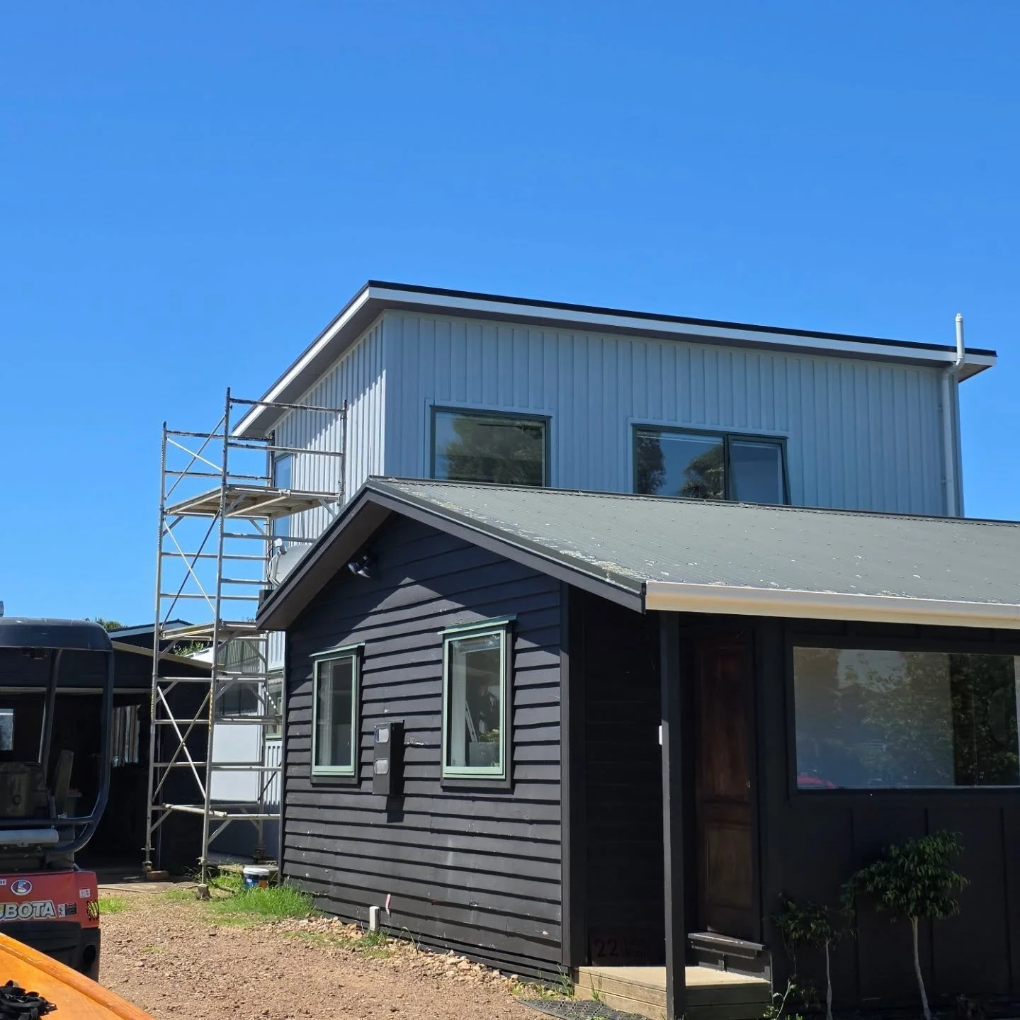 From weathered timber to crisp and clean!

Just finished transforming this exterior with fresh board &amp; batten cladding paint. A huge difference and a whole new lease of life for the home.

Loving how the modern colour brings out the architecture 