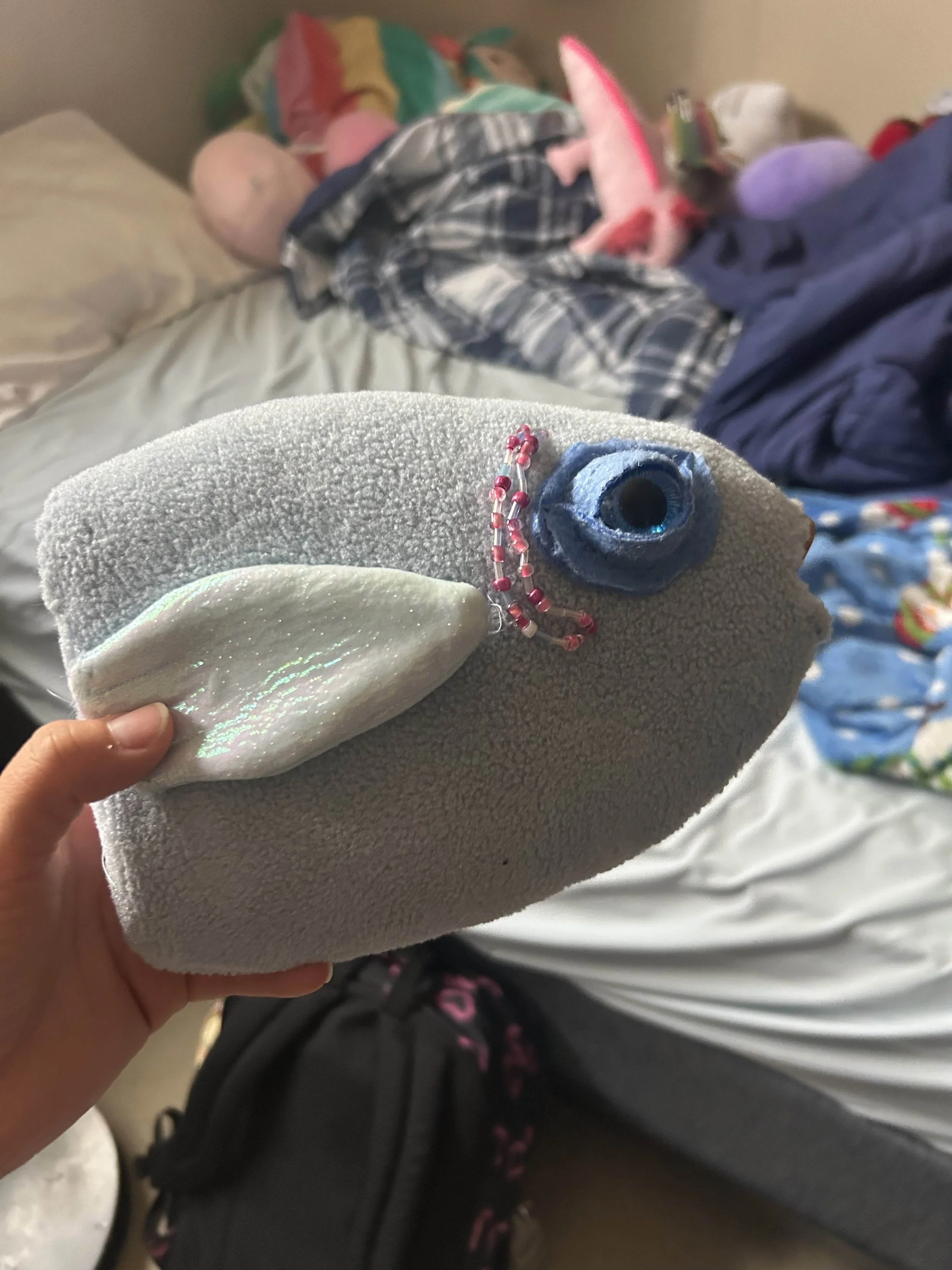 Attatched eye and beaded gills sewn in.