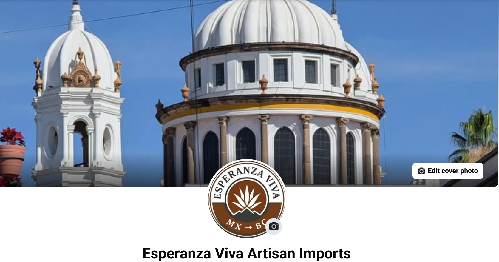 Image of a building with domed roofs and a logo for Esperanza Viva Artisan Imports in front, featuring a stylized plant or leaf design.