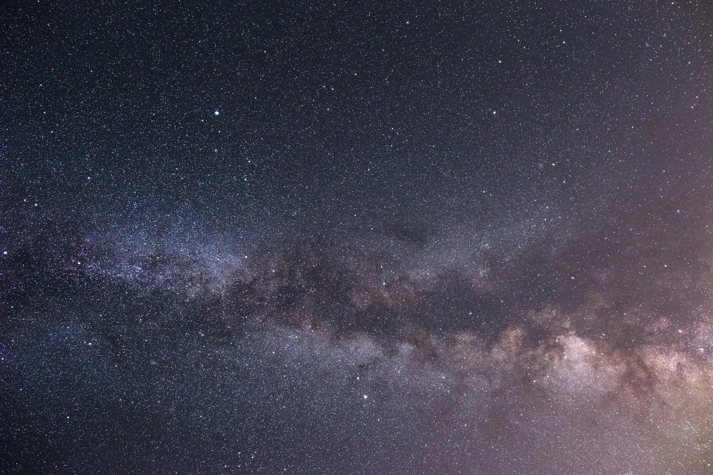 Star-filled night sky with visible milky-way.