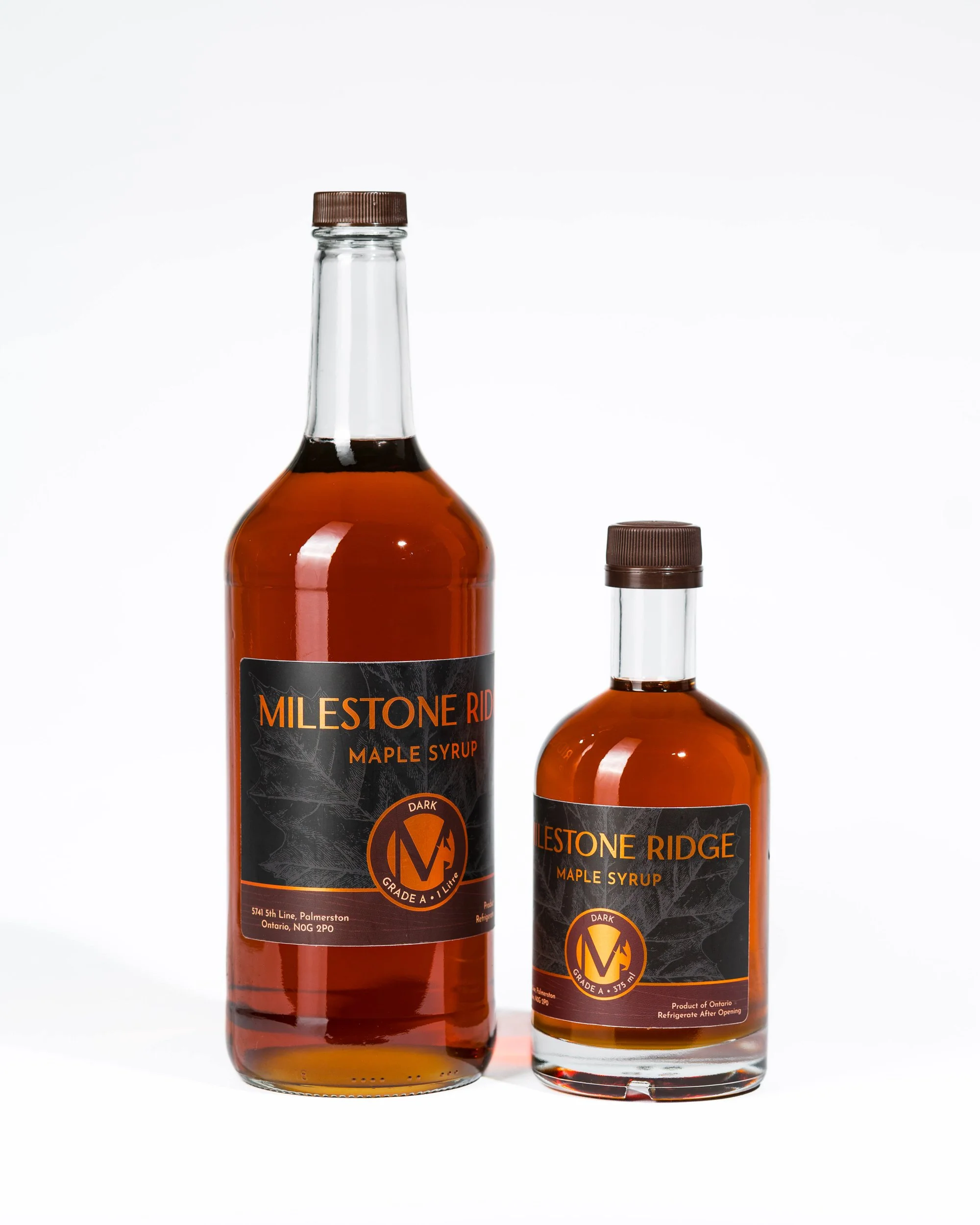 2 bottles of Milestone Ridge Maple Syrup - Pure Ontario maple syrup from Palmerston, Ontario, Canada. Grade A maple syrup available for purchase in golden maple syrup, amber maple syrup, dark maple syrup, bourbon barrel-aged maple syrup.