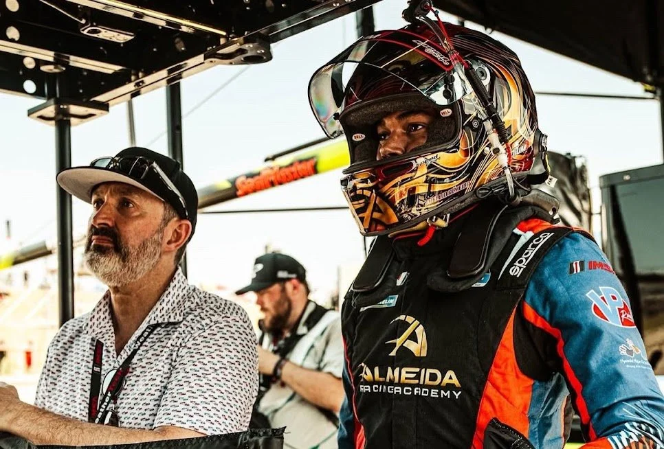 Greg Hoobler, motorsports manager for Suellio Almeida - in his race suit and helmet